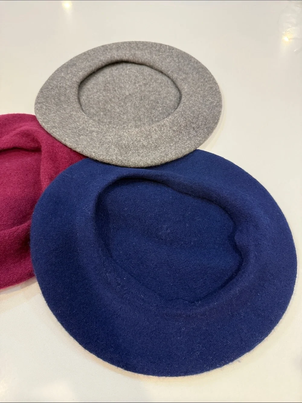Three Wool Berets in Navy, Burgundy, and Gray